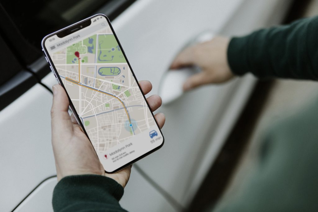 man looking at a map on his smartphone man looking at a map on his smartphone
